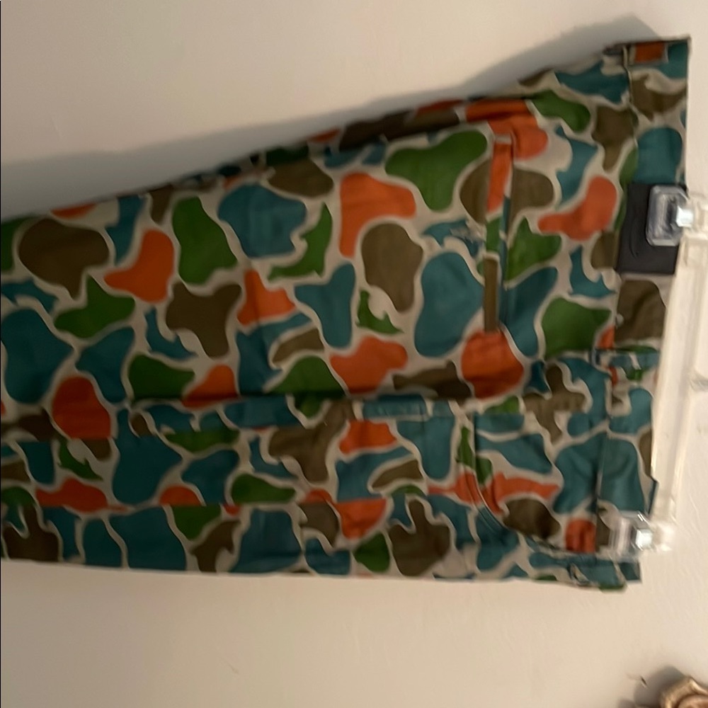 Vibrant Green and Orange Chinos with Camouflage Design
